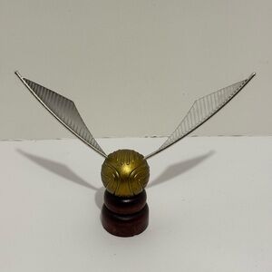 Harry Potter Golden Snitch with Silver Wings Universal Studio Toy Wooden Base